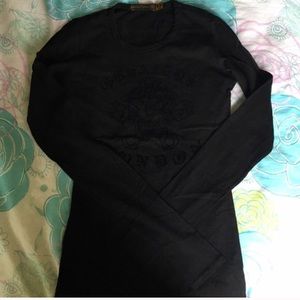 Johnson Motors Inc black long sleeve shirt